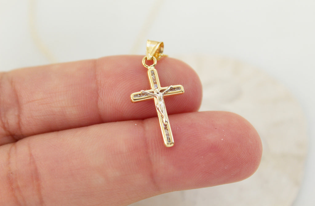 14K Gold Crucifix pendant with Cubic Zirconias imbedded into the crucifix.