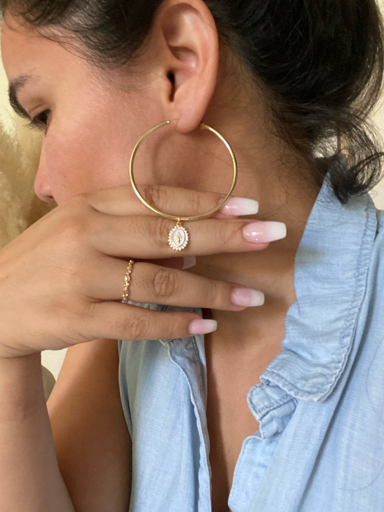 Gold Filled Hoop Earrings with Gold Filled Marian medals. Marian Medals have a beautiful white enamel & there's a frame of tiny cubic zirconias around the entire medal. Medal Size: .43”x.30”. Hoops Size: 1.96"