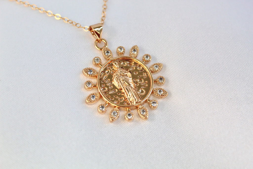 Gold Filled Saint Jude Round medal necklace. The Medal has little rays framing it.