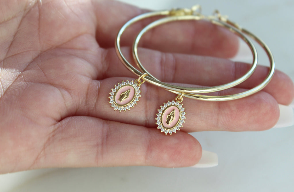 Gold Filled Hoop Earrings with Gold Filled Marian medals. Marian Medals have a beautiful powder pink enamel & there's a frame of tiny cubic zirconias around the entire medal. Medal Size: .43”x.30”.