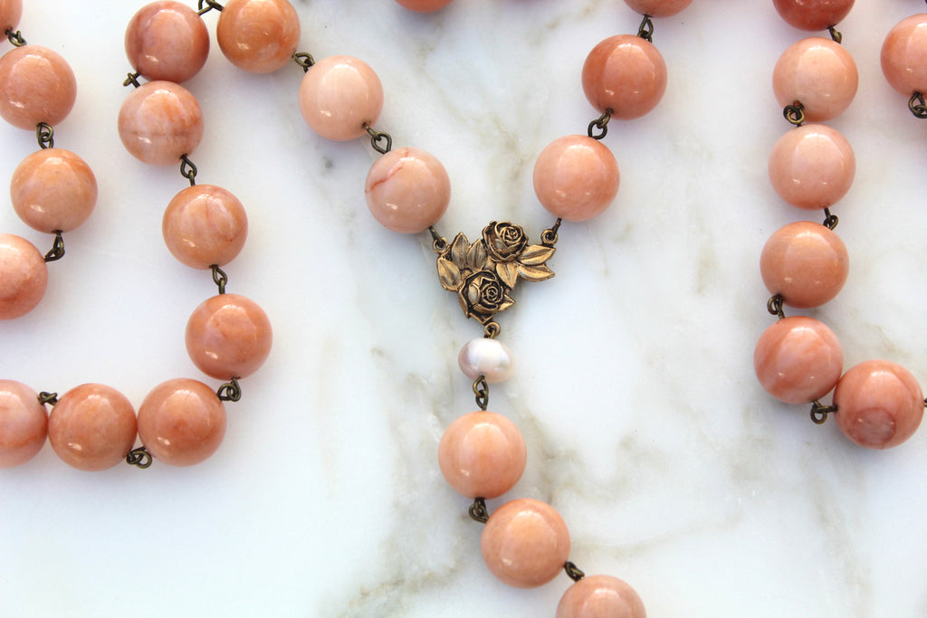 This Rosary is smooth to the touch, Each stone has it's own unique color.
