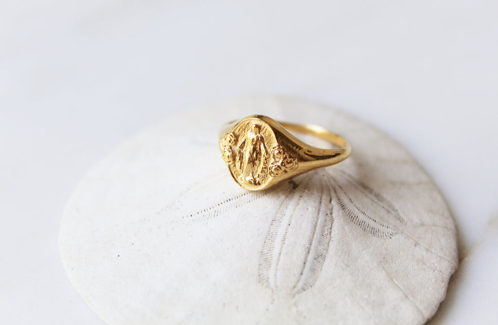 Catholic Signet Ring in Vermeil. It's a Miraculous Medal Signet ring. The from of the ring has mary with 6 roses, the inside has the MArian Cross with the stars and two sacred hearts. completely handmade in Southern California.