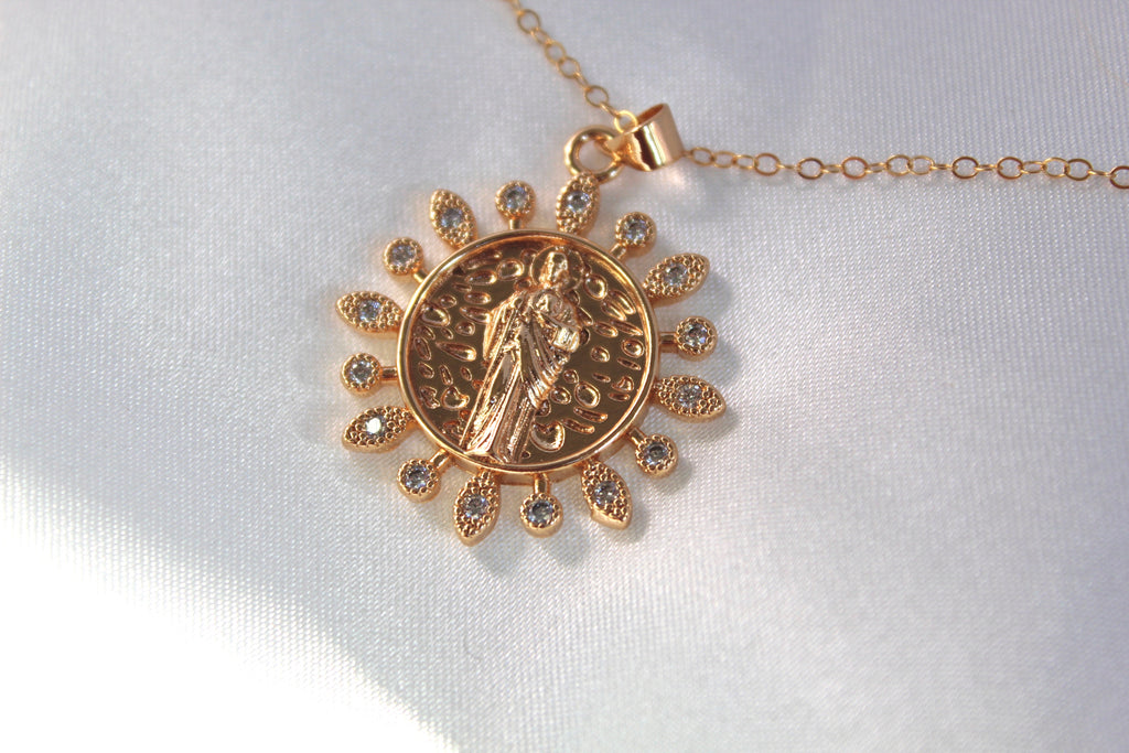 Gold Filled Saint Jude Round medal necklace. The Medal has little rays framing it.