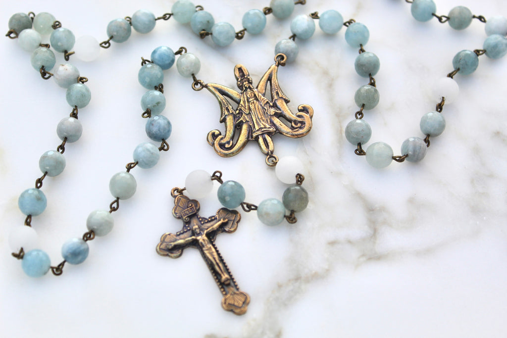 Arial shot of the Blue Stone Rosary. Each stone bead of the Rosary has its own unique blue color.