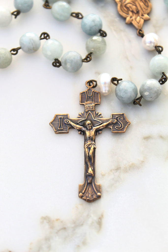 Photo showing solid bronze crucifix. Crucifix is ornate and gorgeous.
