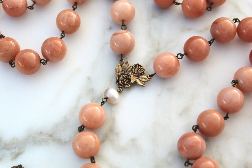 Pink Stone Rosary perfect for anyone who has a devotion to the blessed mother and St. Therese.